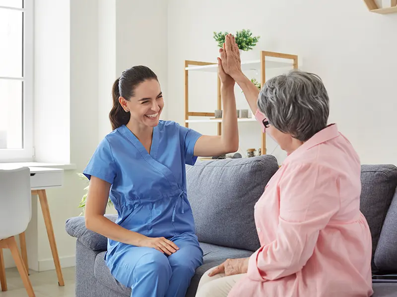 A nurse helping with supportive living services